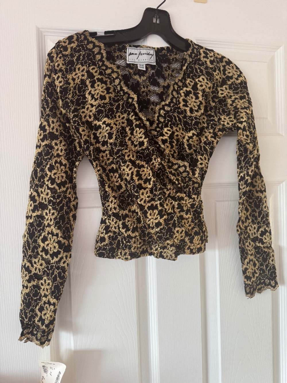 Brand new, never worn black & gold lace top